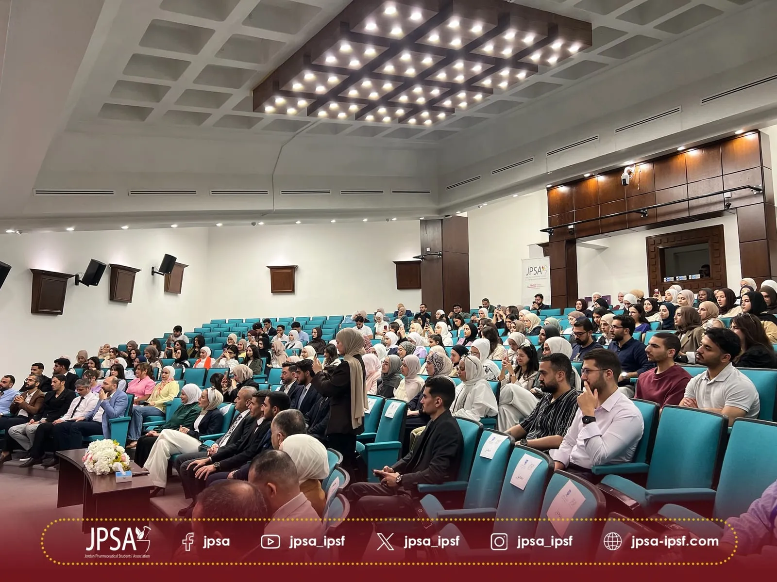 A full lecture hall during the convention